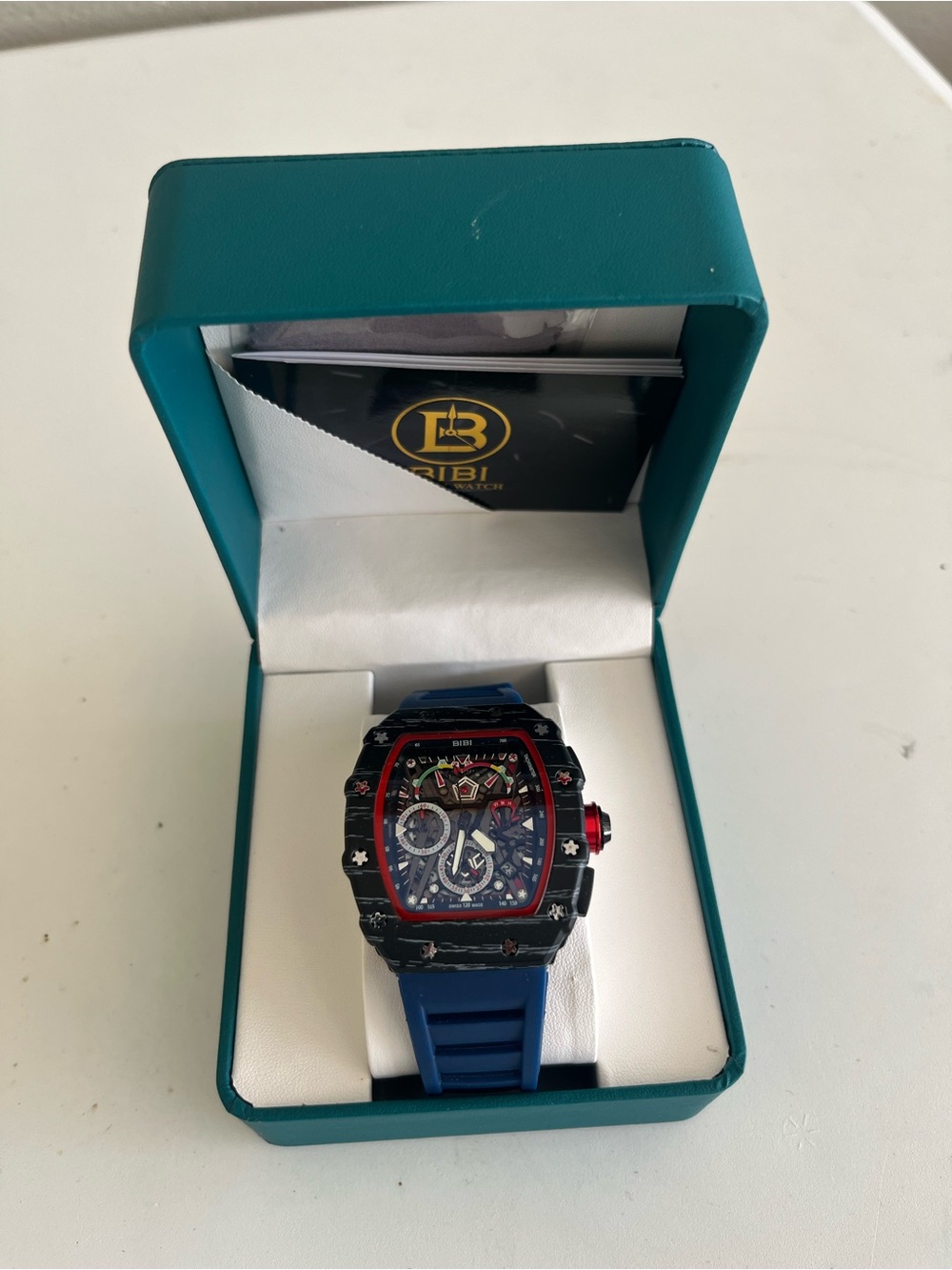 BiBi Blue Strap Men's Skeleton Dial Watch with Red Accents
